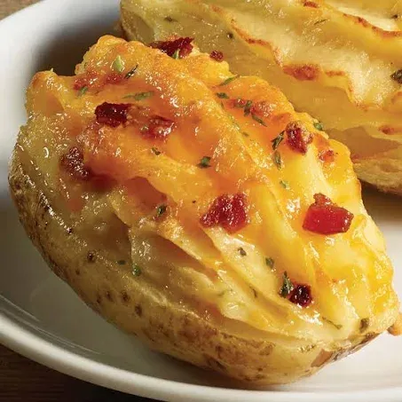 Deliciously Loaded Twice Baked Potatoes - Gourmet side dish made with real butter and cheddar cheese. Perfect for steaks, roasts, seafood, and burgers from Kansas City Steak Company (8-Count, 5 oz each)