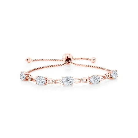 Gem Stone King 18K Rose Gold Plated Silver White Moissanite and White Lab Grown Diamond Tennis Bracelet For Women (4.52 Cttw Gemstone Birthstone Oval 7x5MM Fully Adjustable Up to 9 inch)